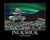 Inukshuk in the Northern Lights